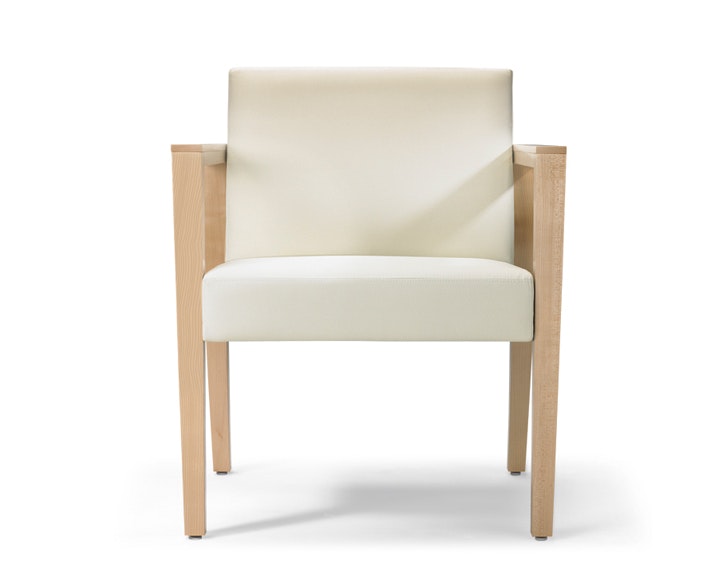 A front view of a Brava 863 Chair with maple frame and white textile.