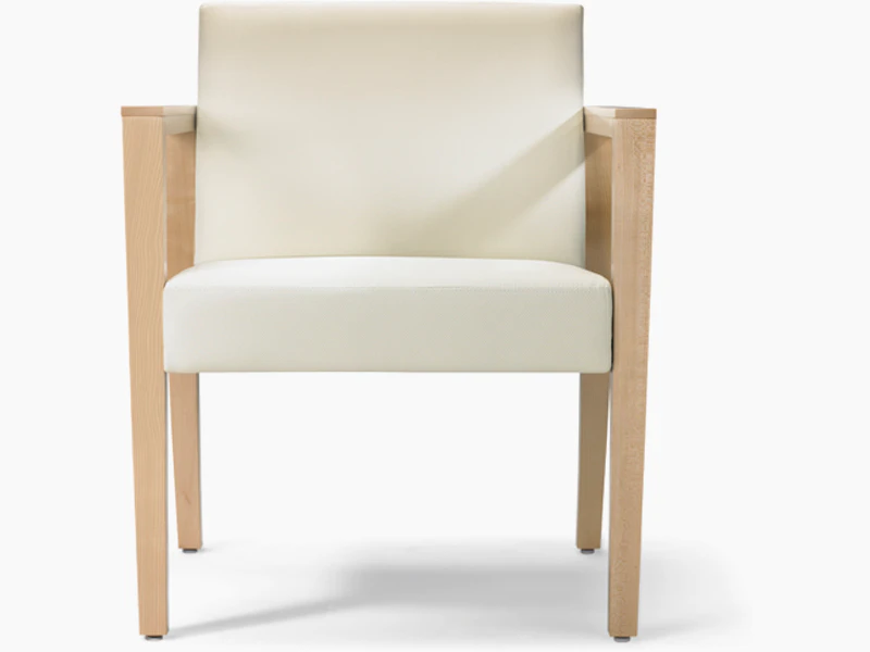 A front view of a Brava 863 Chair with maple frame and white textile.