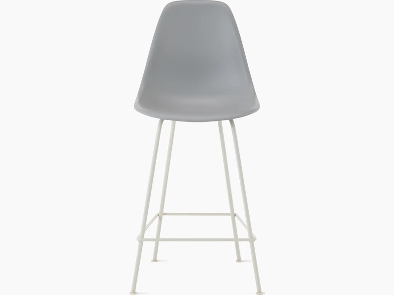 Front of light grey plastic shell stool on 4 leg base.