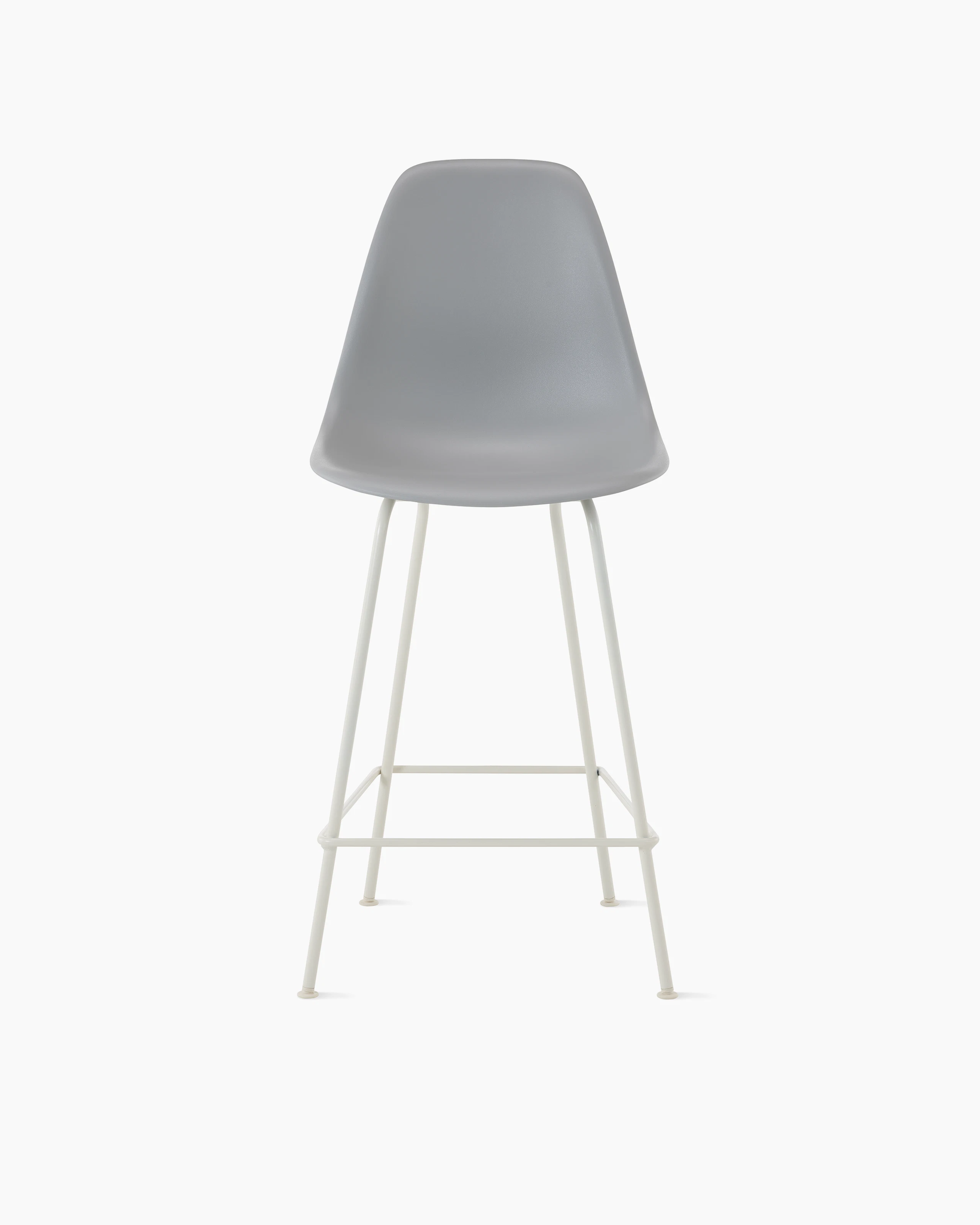 Front of light grey plastic shell stool on 4 leg base.