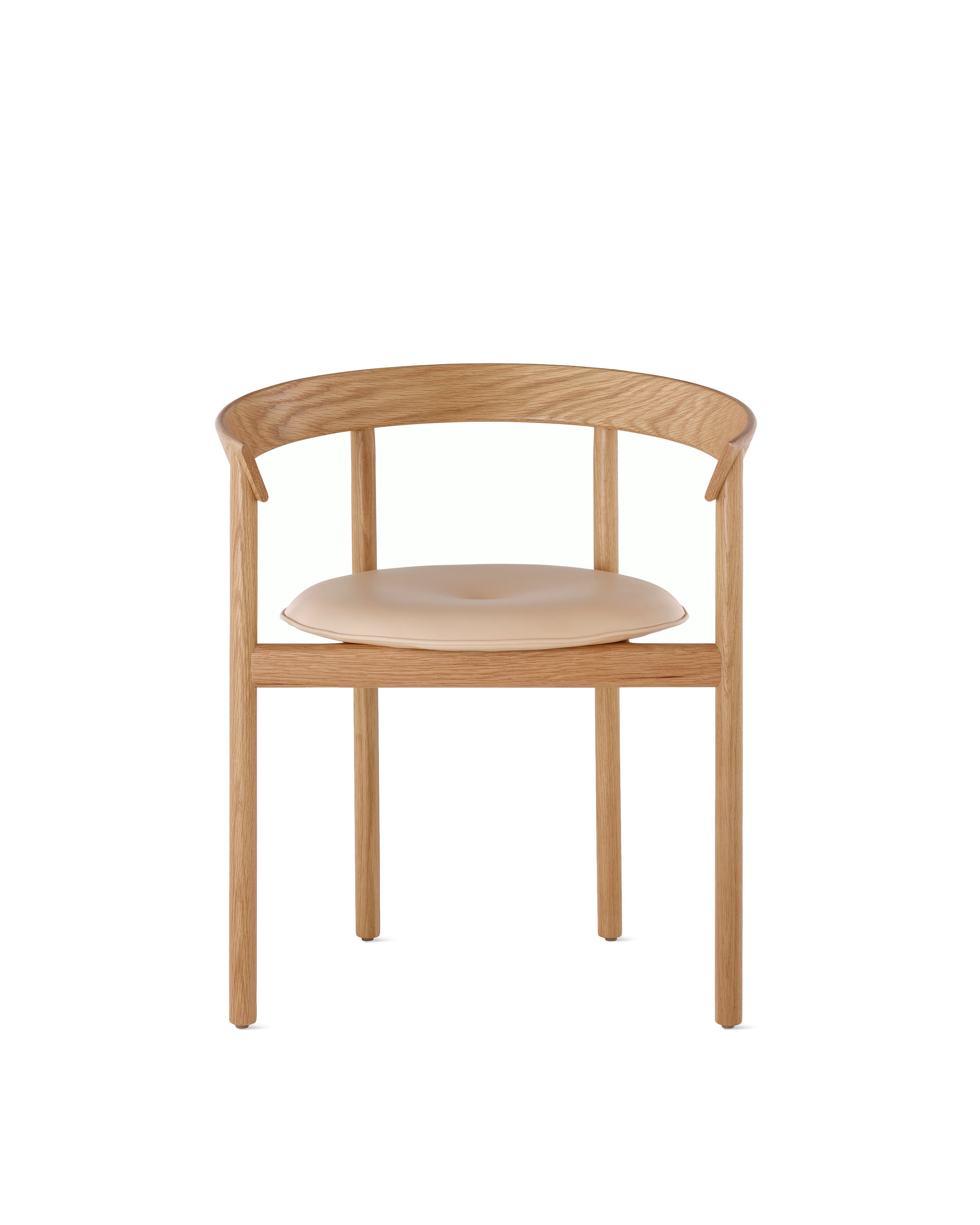 An oak Comma Chair with arms and a seat pad, viewed from the front.