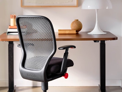 A Newson Task Chair and a Tone Height Adjustable Table in a home office setting.