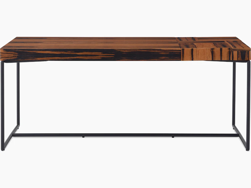 A Domino Desk with wood top and metal base.