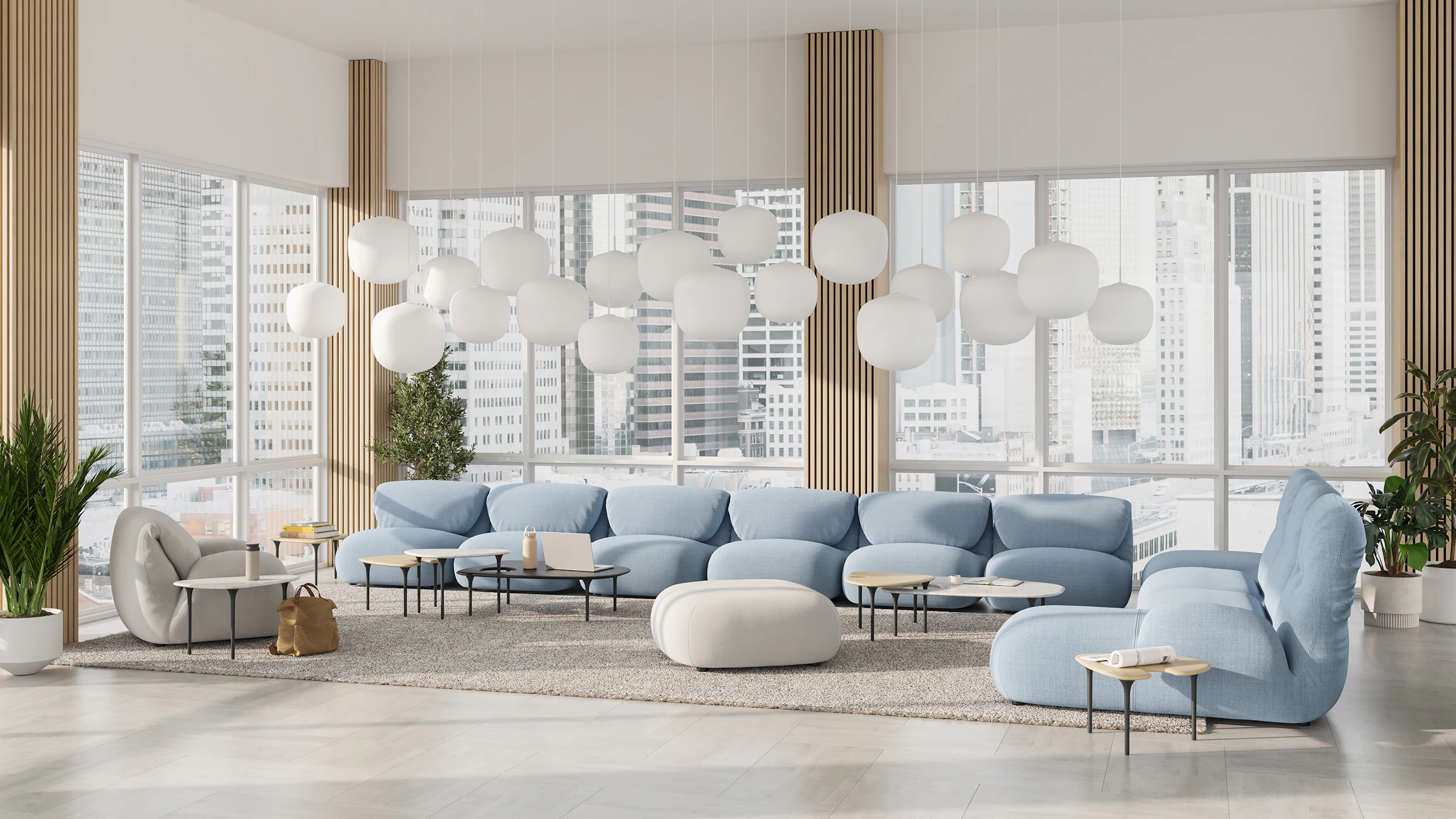 Luva Modular Sofa and Cyclade Tables in a commercial lounge setting