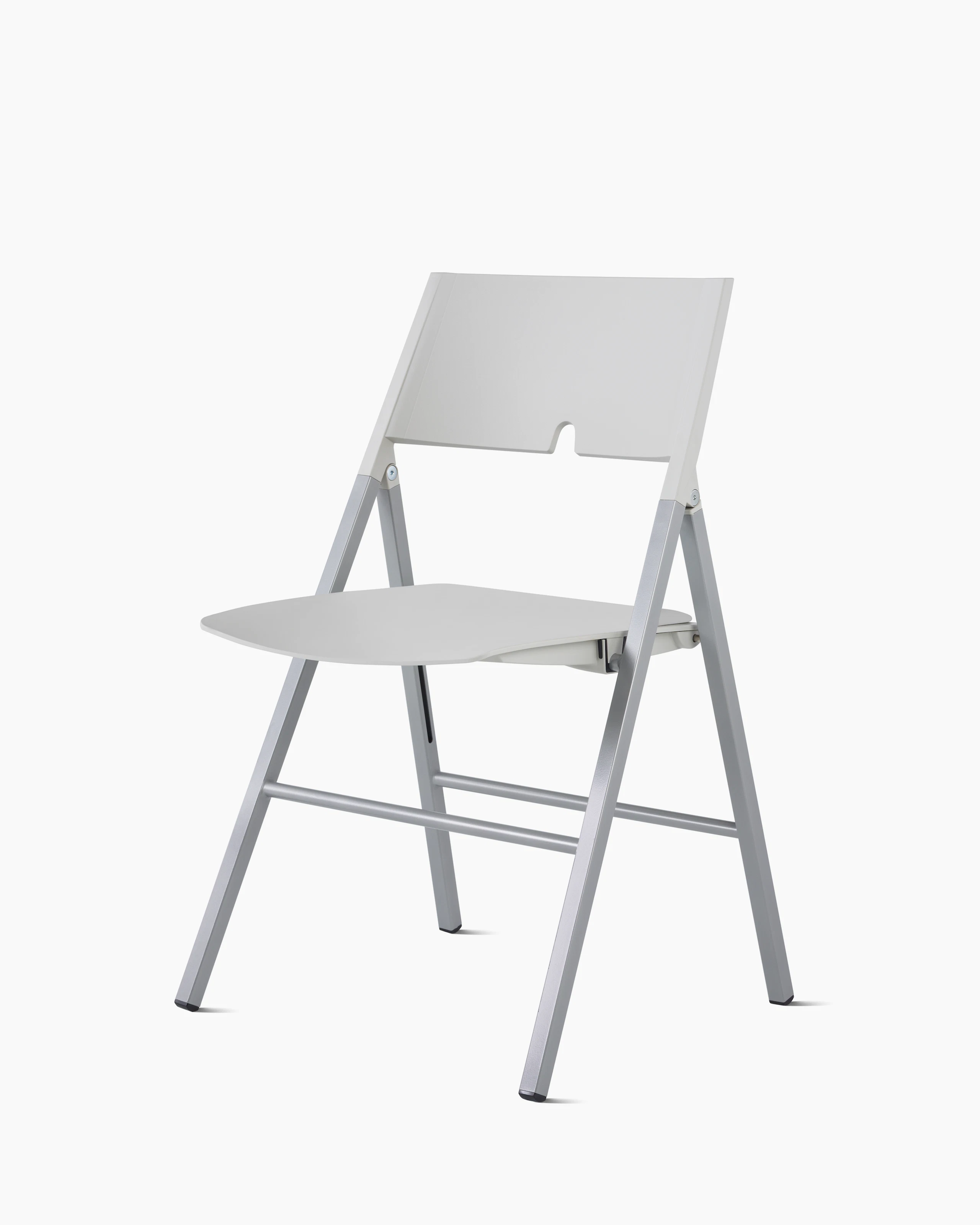 Angled front view of an Axa Folding Chair with a non-upholstered seat and back in a light gray plastic and silver metal frame and legs.