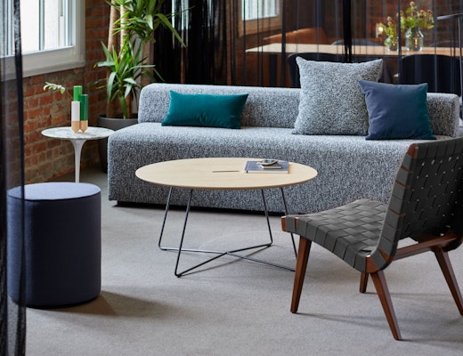 Risom Lounge Chair, k. lounge and Saarinen Side Table with Muuto rockwell unscripted coffee table k. lounge modular seating rockwell unscripted ottoman muuto tube base Risom Lounge Chair Saarinen Side Table leaf floor lamp around coffee table essentials welcoming community