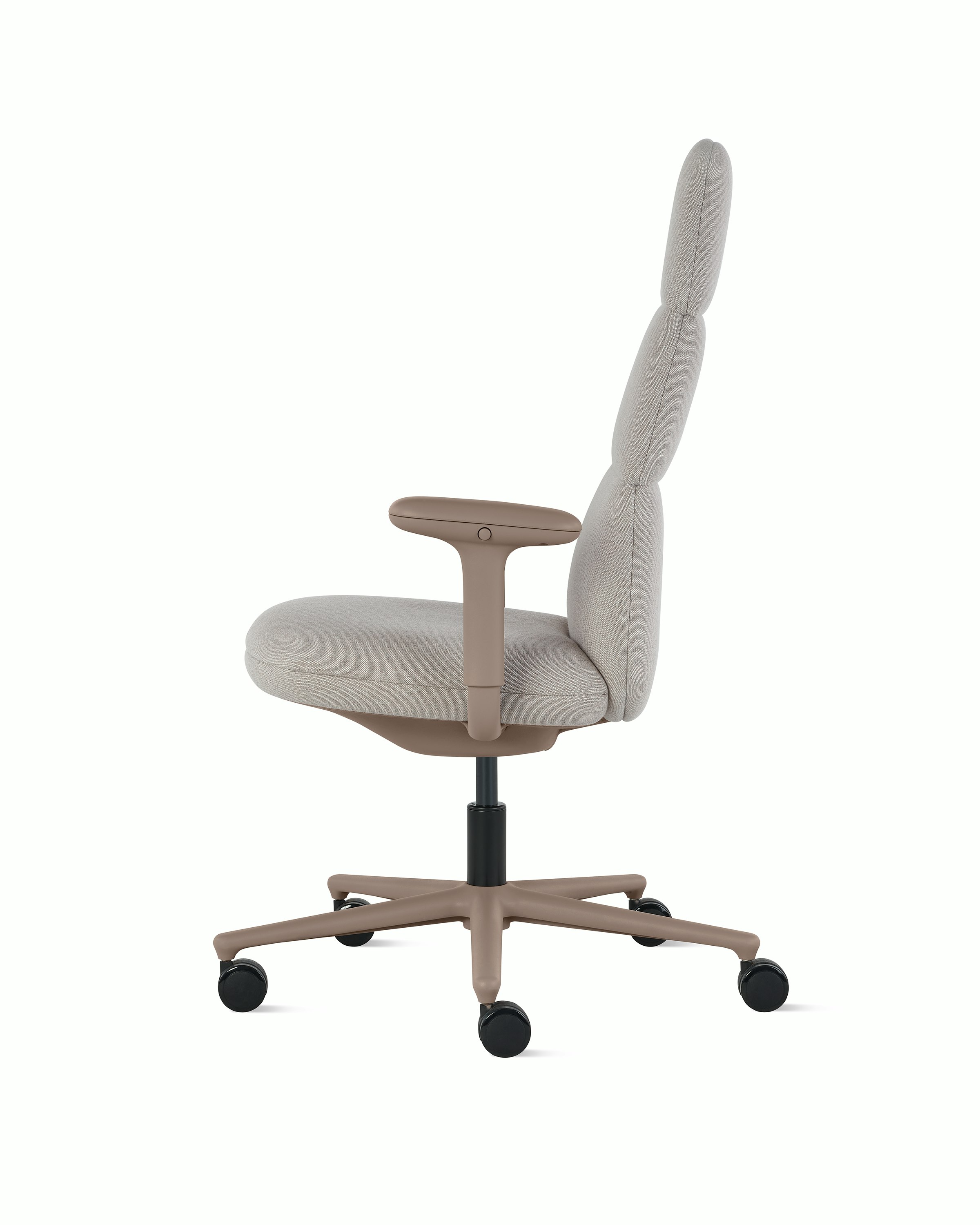 Side view of a high-back Asari chair by Herman Miller in light brown with height adjustable arms.