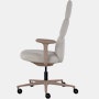 Side view of a high-back Asari chair by Herman Miller in light brown with height adjustable arms.