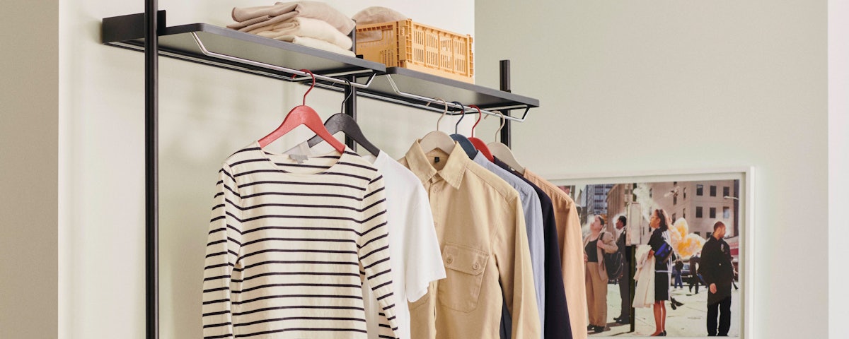 Pier Wardrobe holding hanging shirts and clothes in bedroom setting