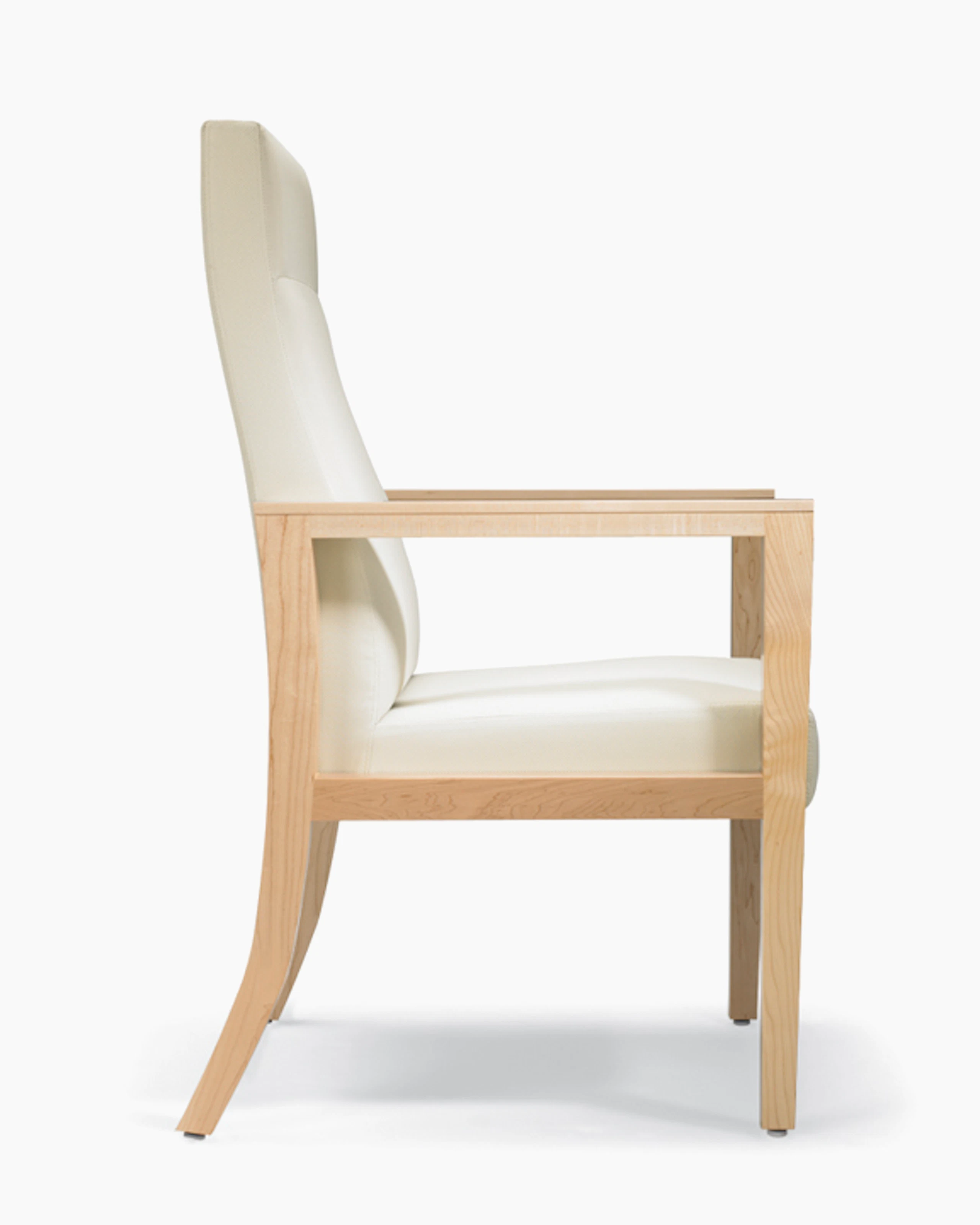 A side view of a Brava 863 high back patient chair in white textile with open maple wood arms.