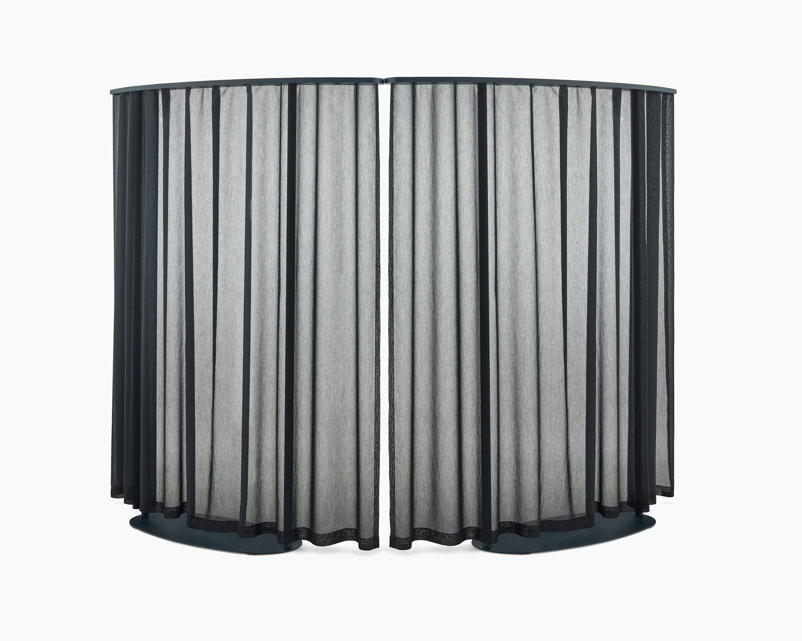 Two curved dark blue OE1 Freestanding Curtains with blue frames viewed from a front angle.