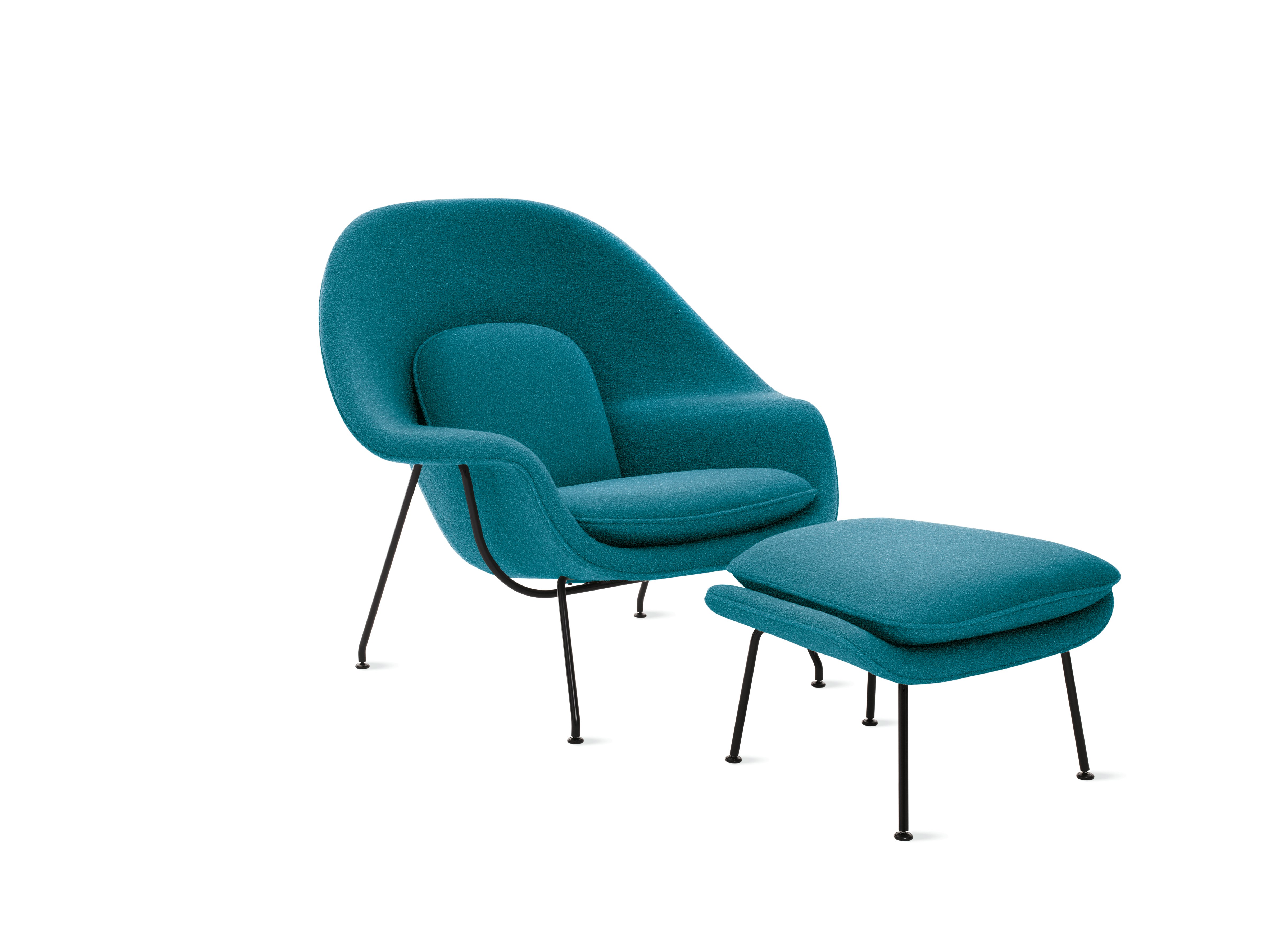 An aegean Womb Chair & Ottoman viewed from an angle