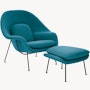 An aegean Womb Chair & Ottoman viewed from an angle