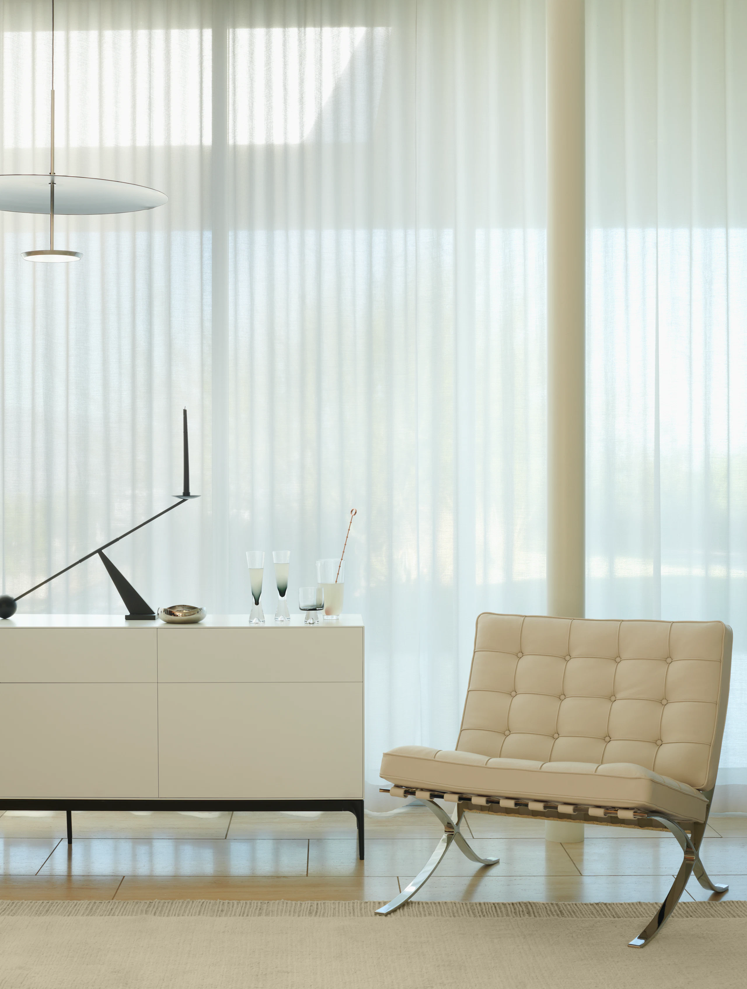 Lauki Credenza and Barcelona Chair