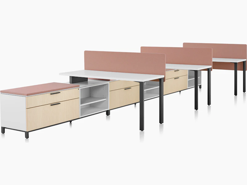 3-pack Canvas Storage workstation with white surfaces, pink screens, and graphite legs.
