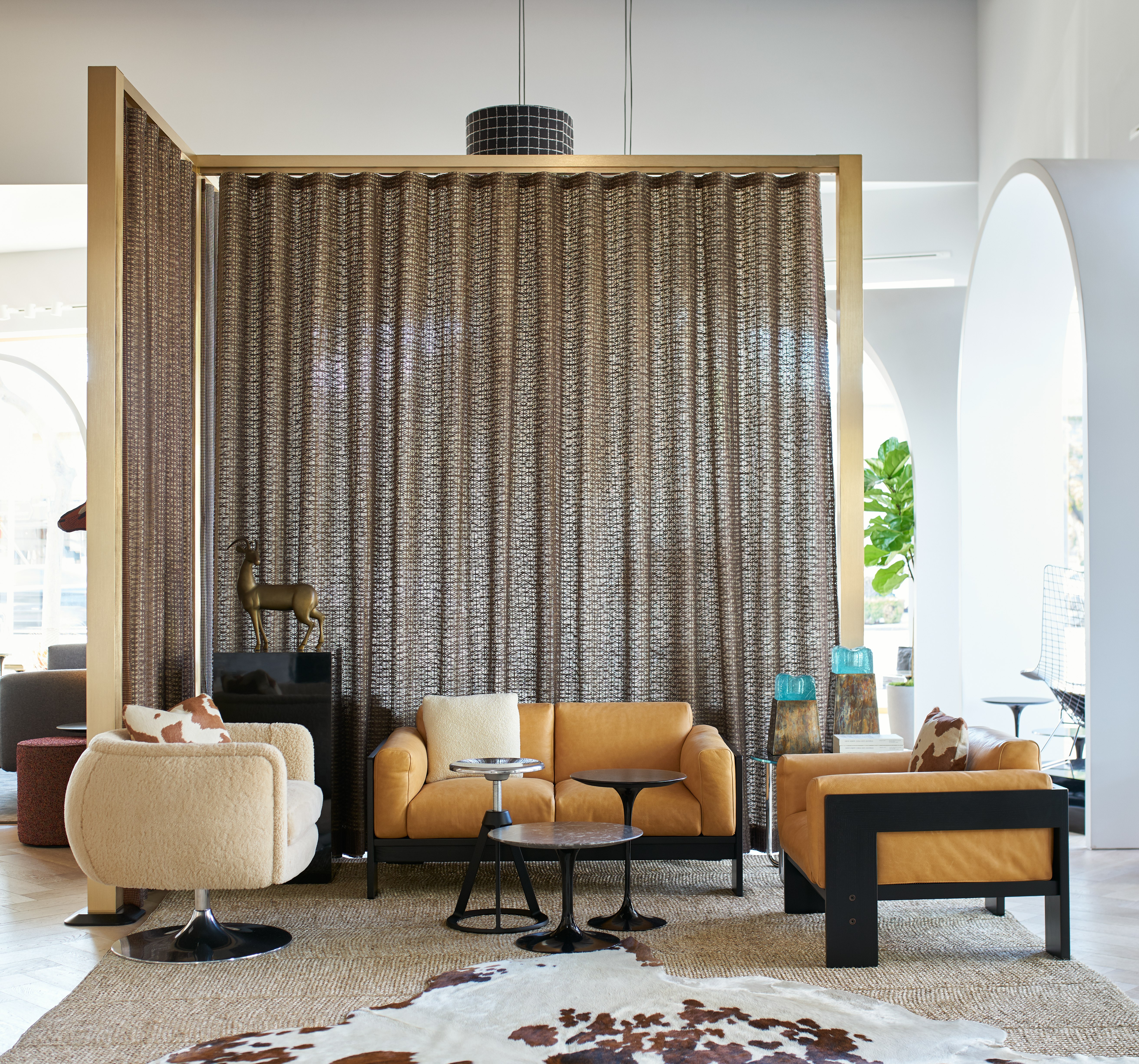 Los Angeles Home Design Shop Living Room with D'Urso Swivel Chair and Bastiano Sofa