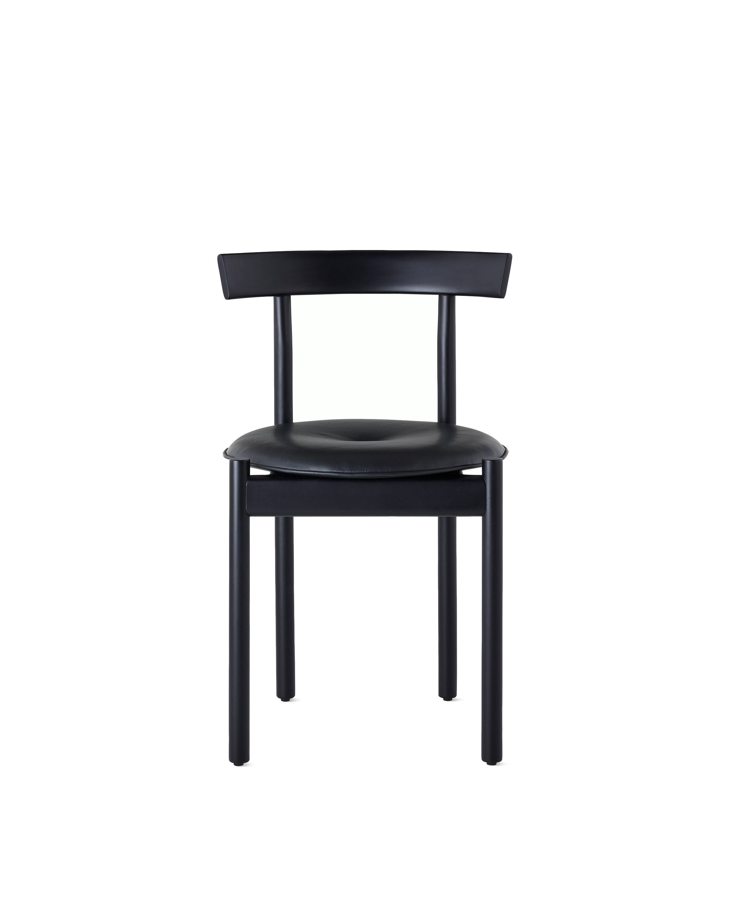 A black Comma Chair with a seat pad, viewed from the front.