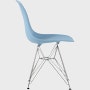 Side of pale blue plastic shell chair with wire base legs.