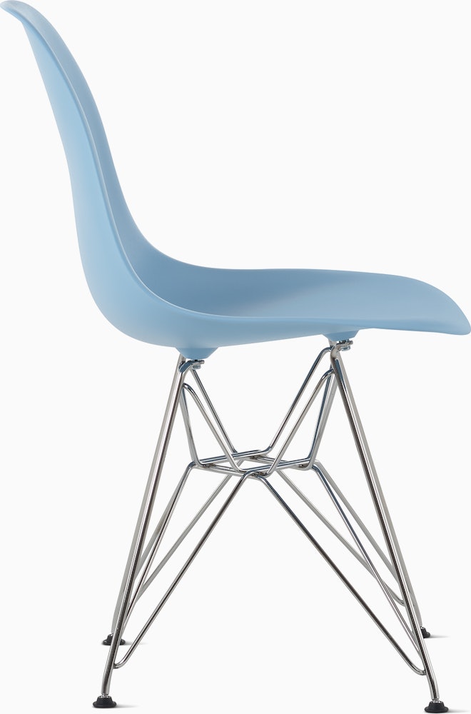 Side of pale blue plastic shell chair with wire base legs.