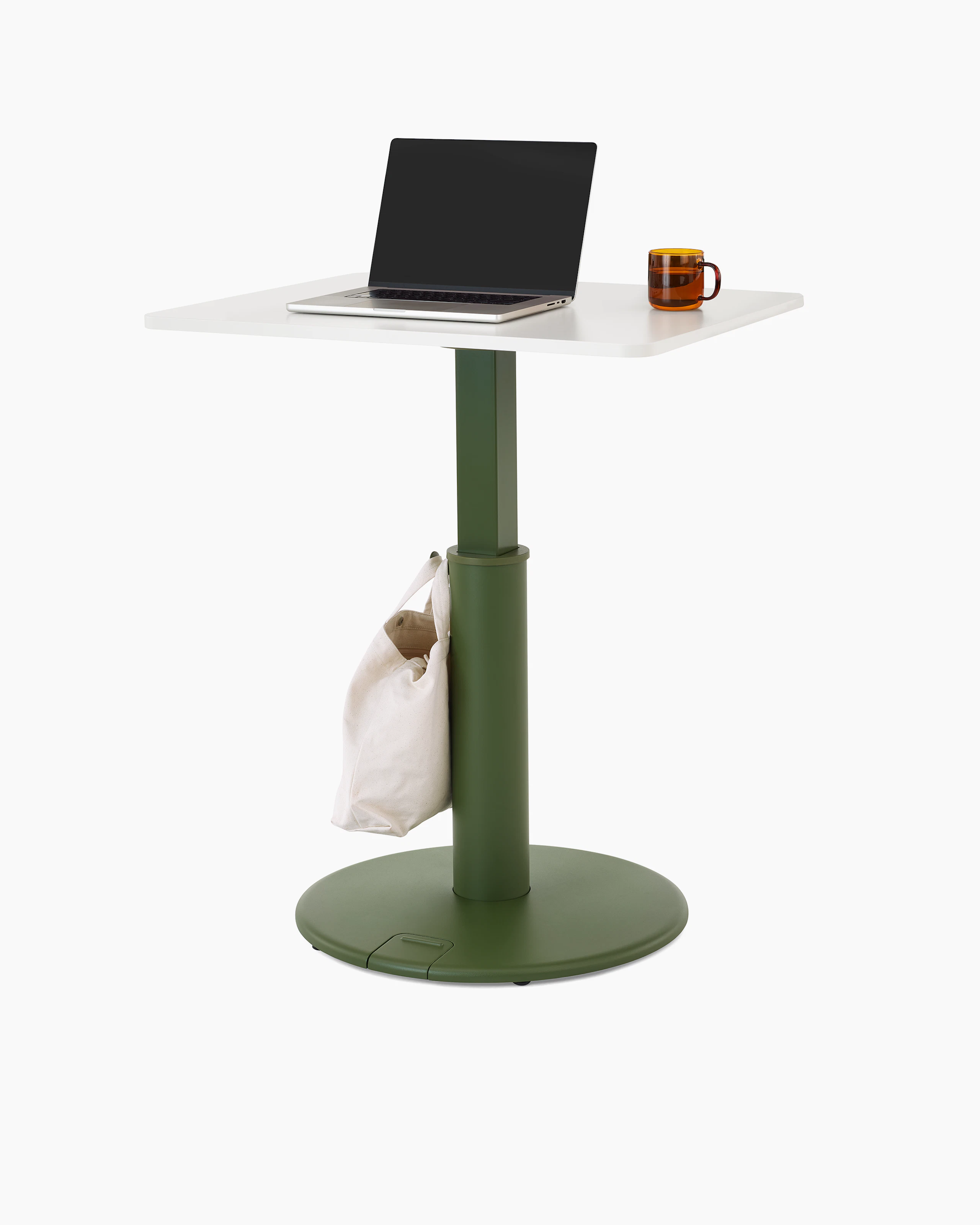 OE1 Sit-to-Stand Table at a standing height with green base and white rectangular surface viewed from a front angle.