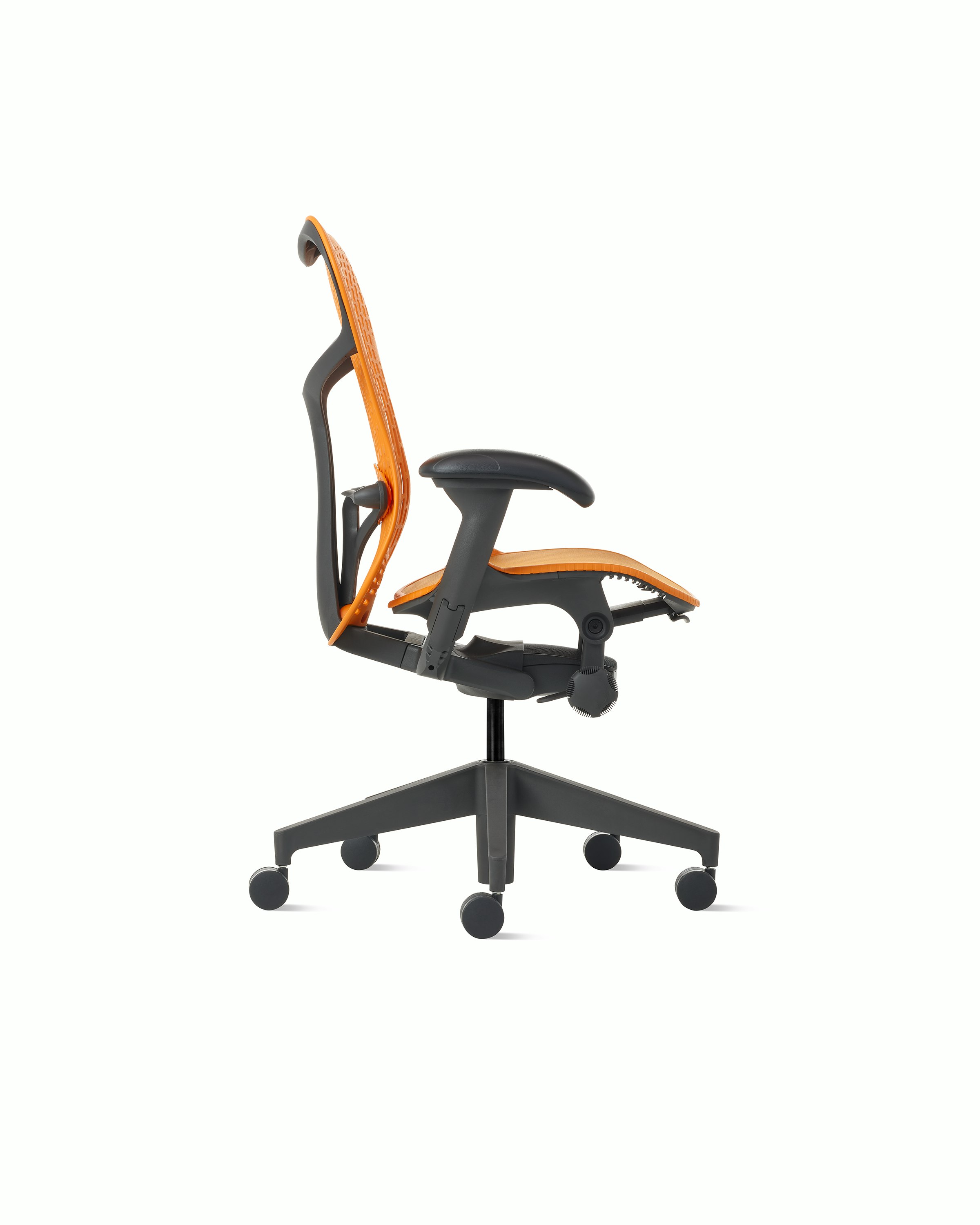 Side  view of a Mirra2 chair with a Trflex back in ochre. 