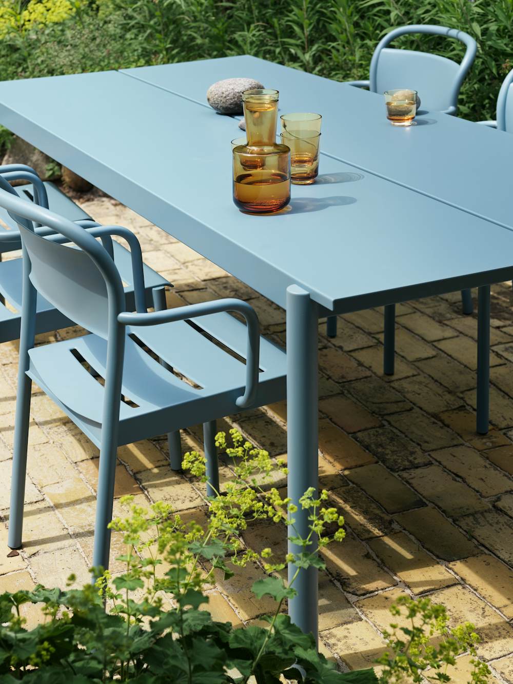Linear Steel Table and Chair,  Raise Carafe,  Raise Glasses