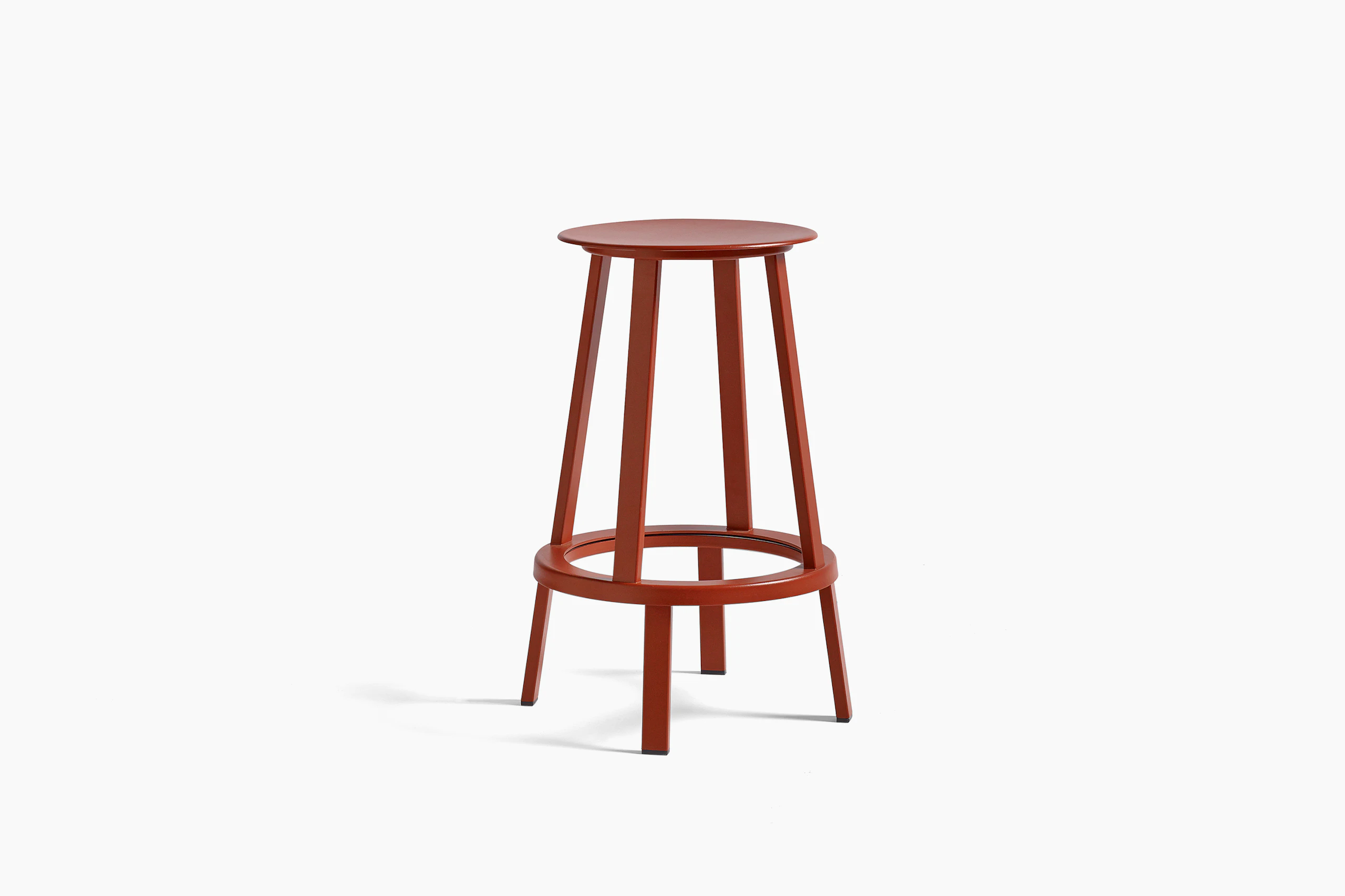 Red Revolver Stool, viewed at an angle.