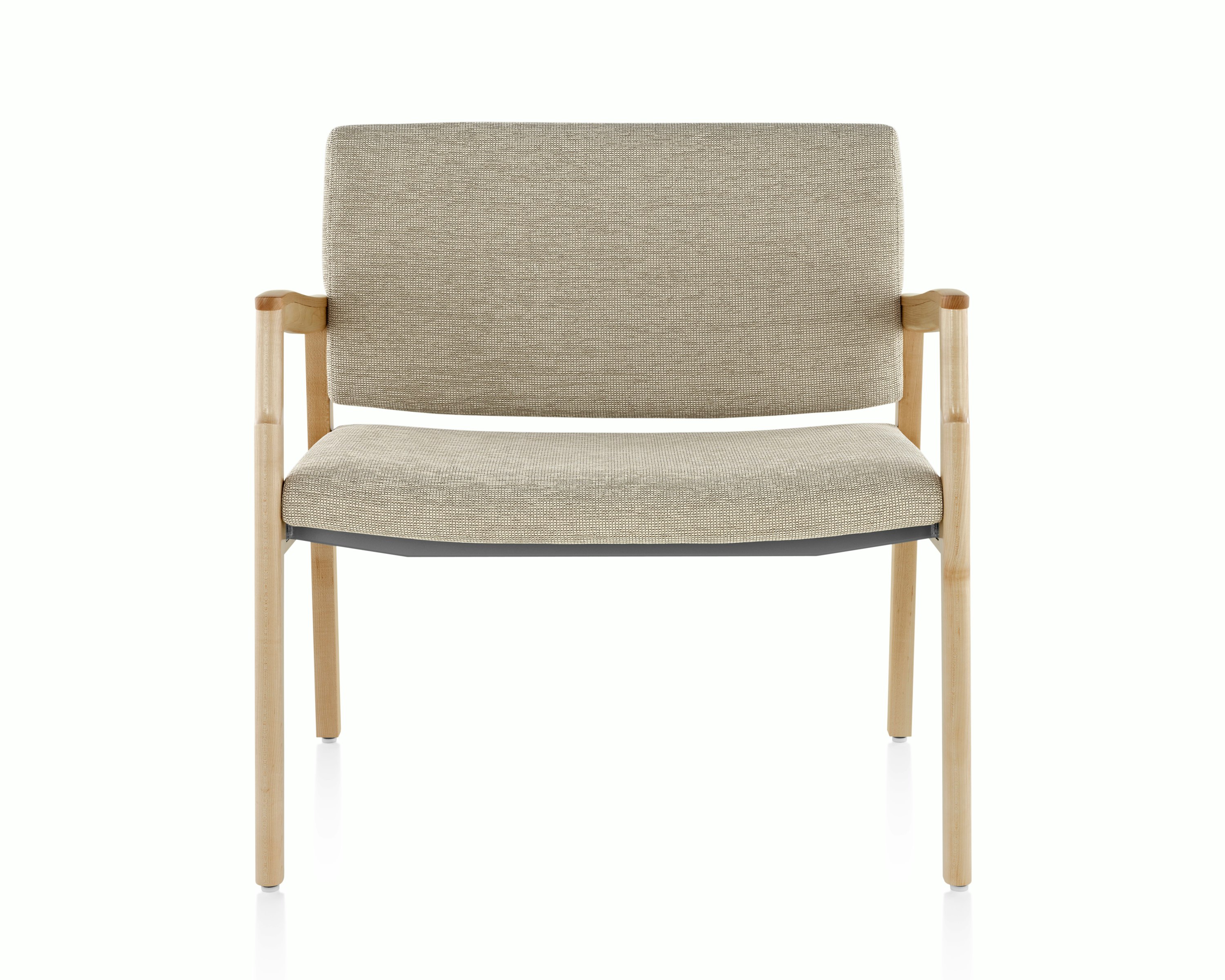A Monarch Plus Chair in tan textile with solid hardwood frame and wood arm caps.