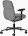 Rear angle view of a mid-back Asari chair by Herman Miller in dark grey with height adjustable arms.