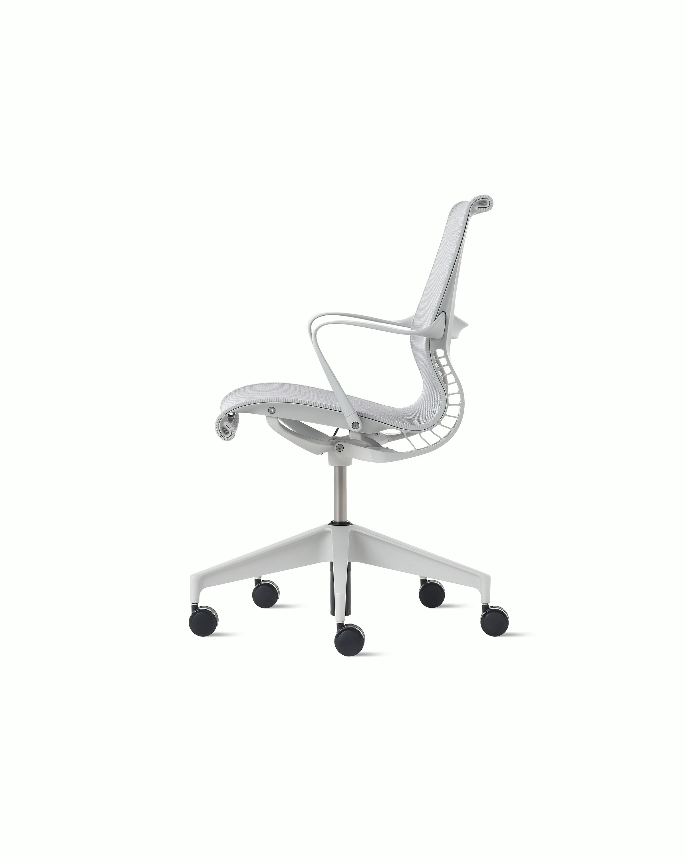 Side view of a Setu chair in light grey.