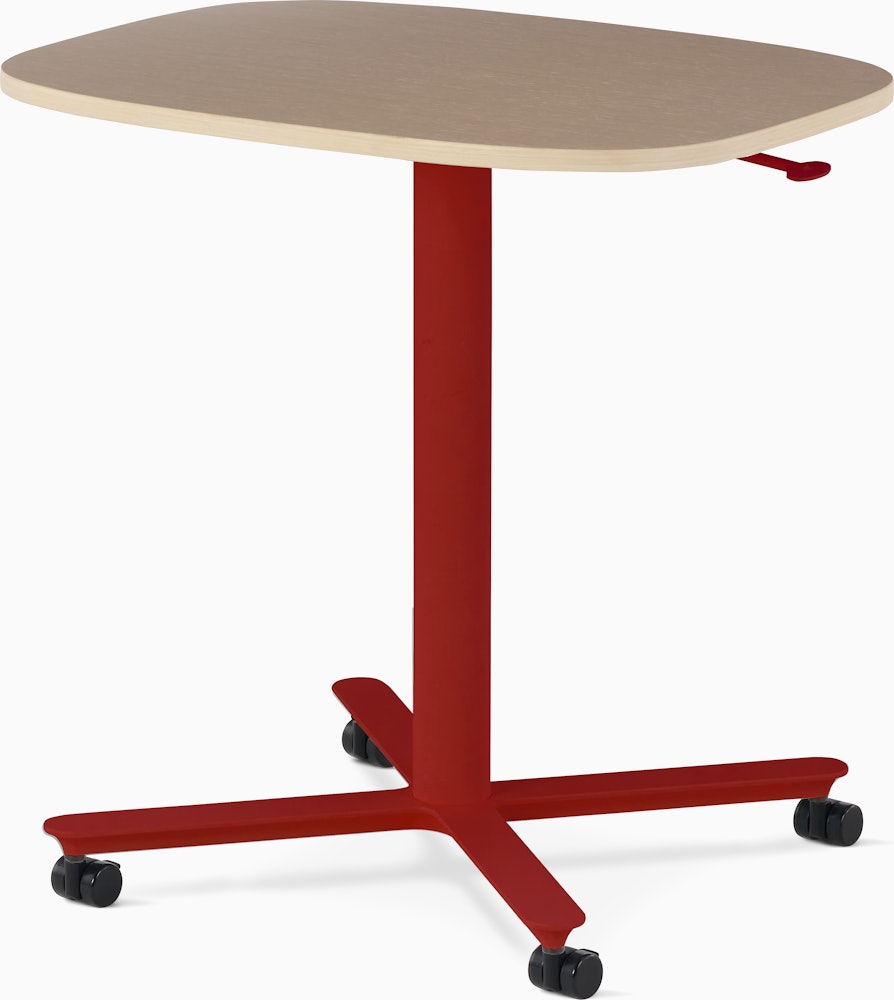 Large Passport Work Table with light woodgrain surface and red base on casters.