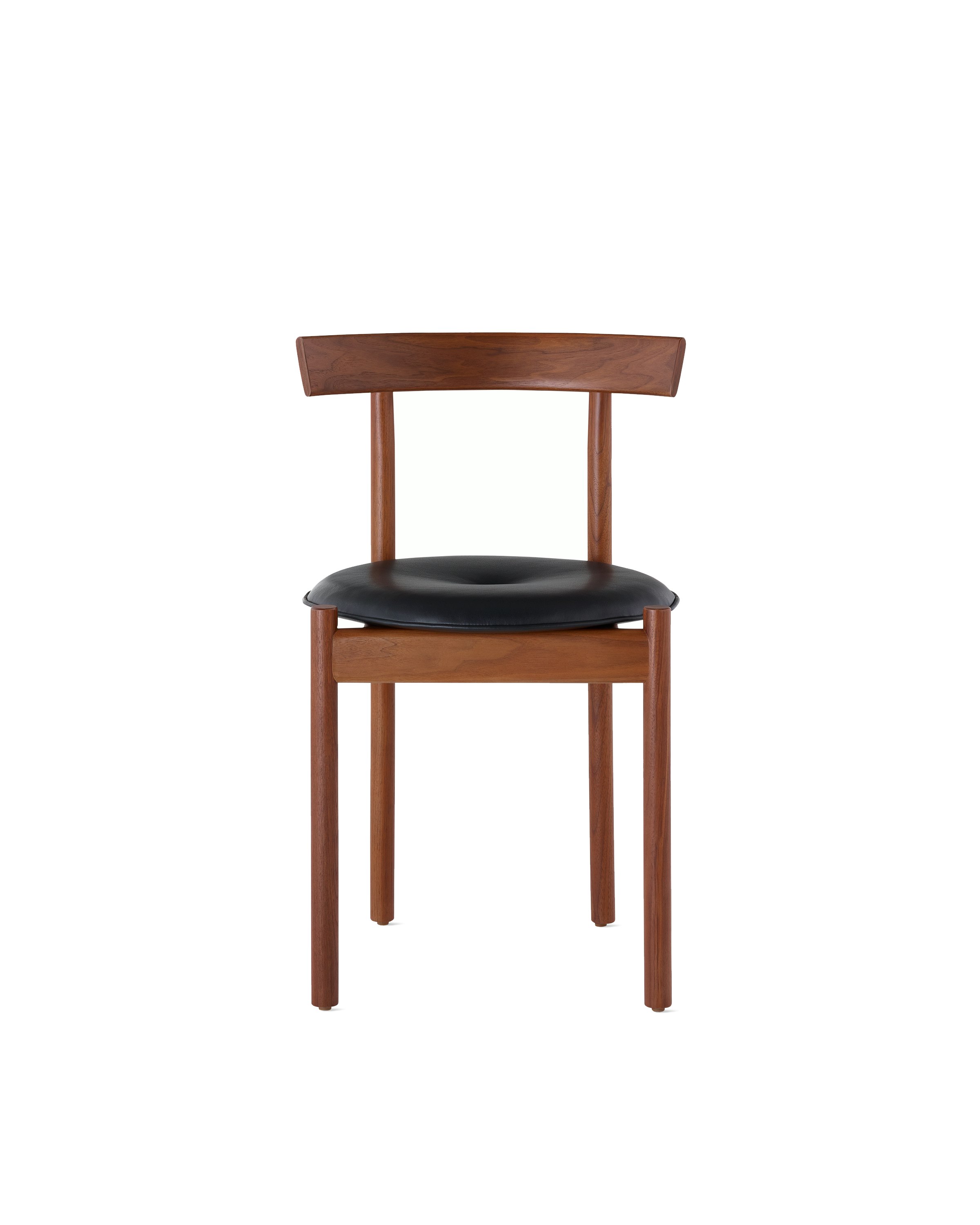 A walnut Comma Chair with a seat pad, viewed from the front.