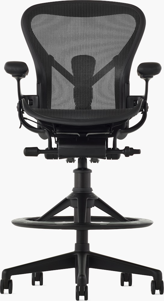 Black matte Aeron Stool on a white background, with a 5-star base and ergonomic back support, viewed from the front.