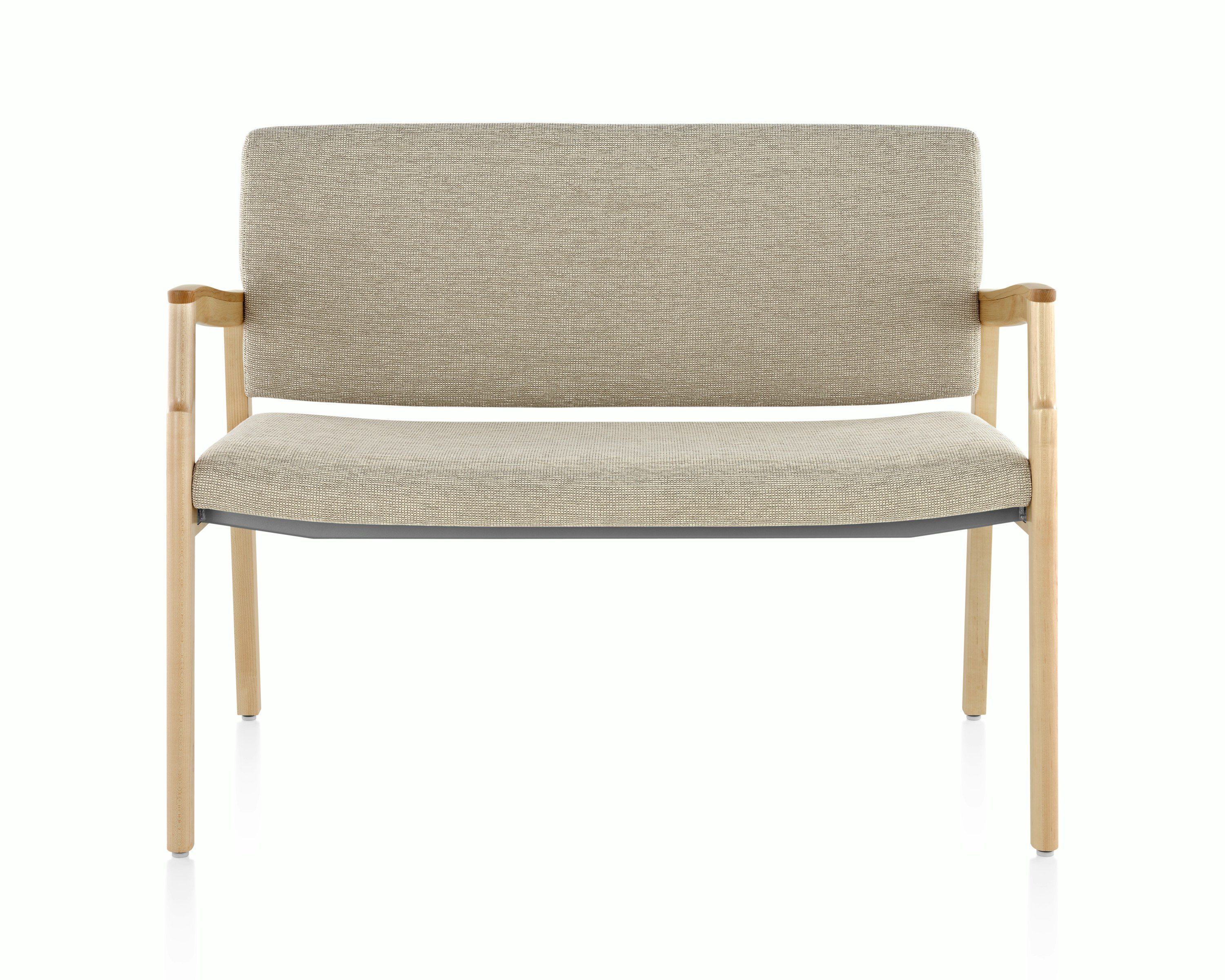 A Monarch Plus Chair in tan textile with solid hardwood frame and wood arm caps.