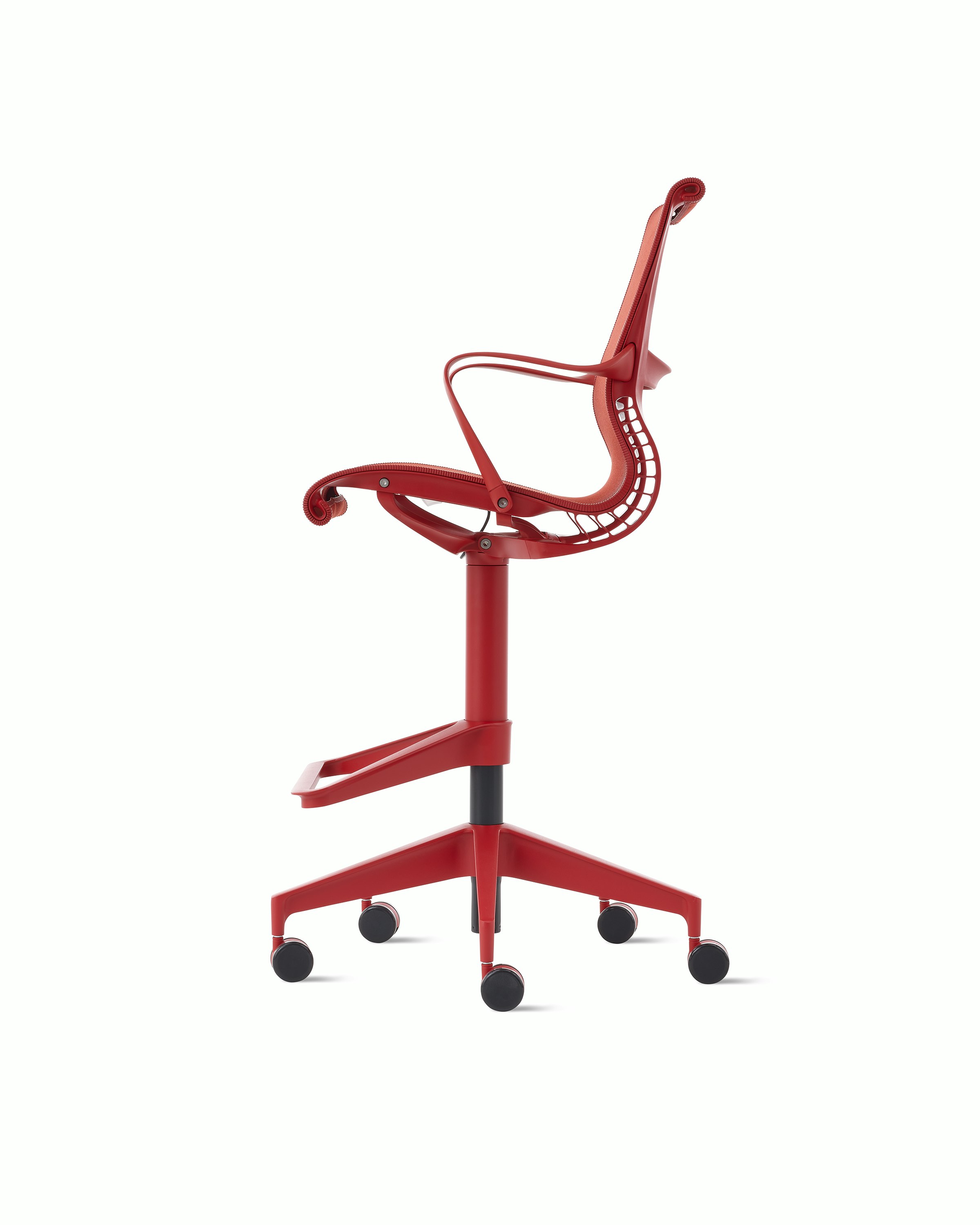 Side view of a Setu stool with fixed arms in red.