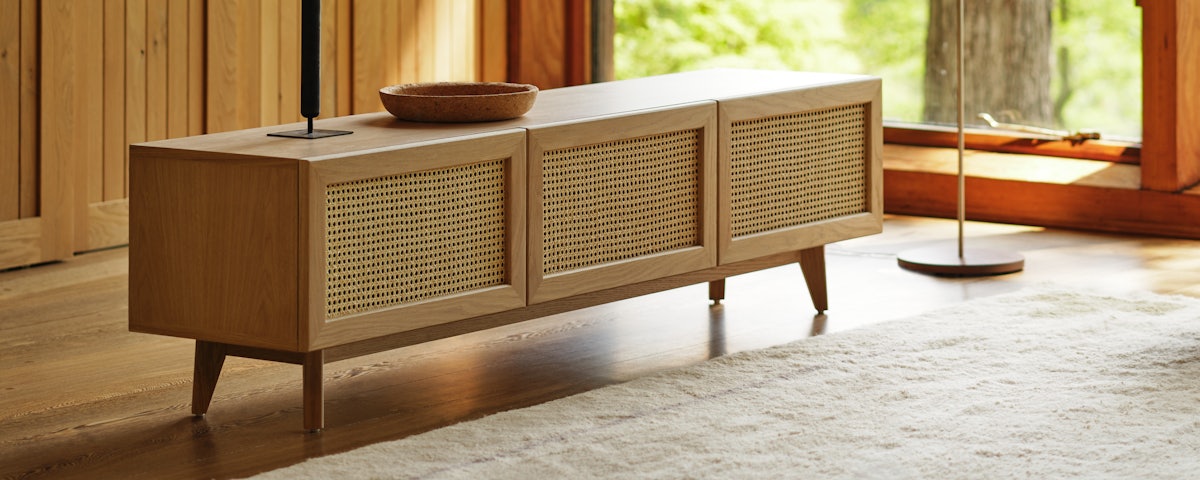 Maíz Media Unit and Nelson Cigar Lotus Floor Lamp in a living room setting