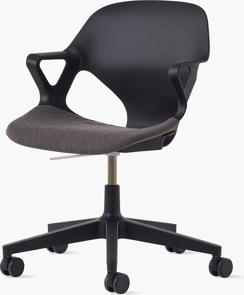 Front angle view of a black Zeph chair with fixed arms and a dark grey seat pad.