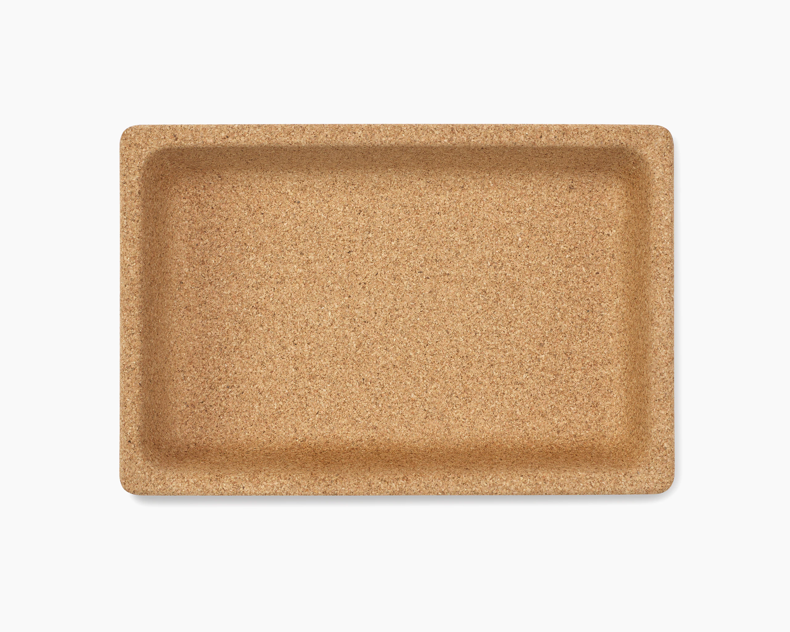 A small tray made of cork material.
