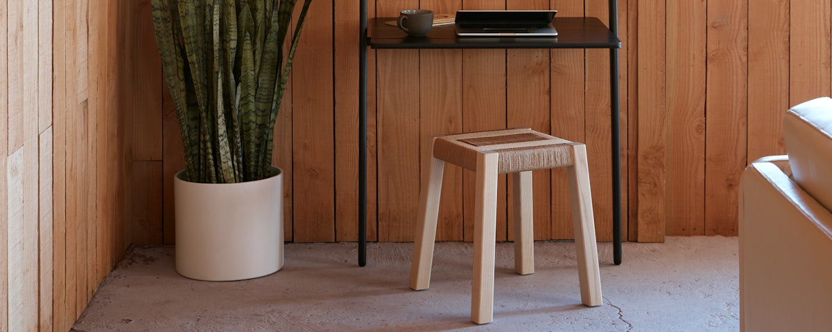 Weaver's Stool at a desk in a home office setting