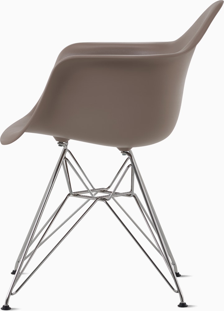 Side of cocoa plastic shell chair with wire base legs.