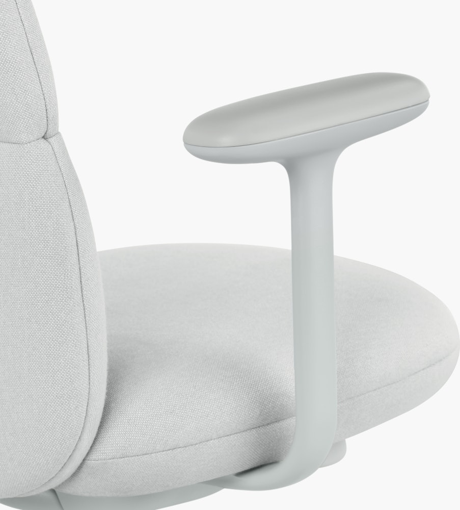 Detail view of an Asari chair by Herman Miller in light grey with fixed arms.