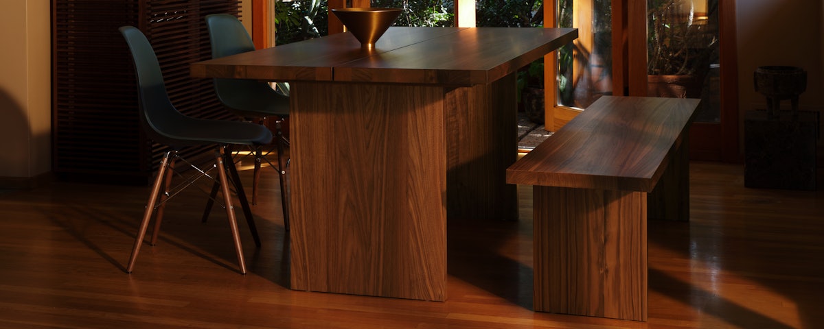 Eames Recycled Molded Plastic Side Chair with Gather Table and Bench in a dining room setting