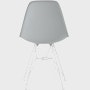 Back of light grey plastic shell chair on wire base.