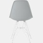 Back of light grey plastic shell chair on wire base.