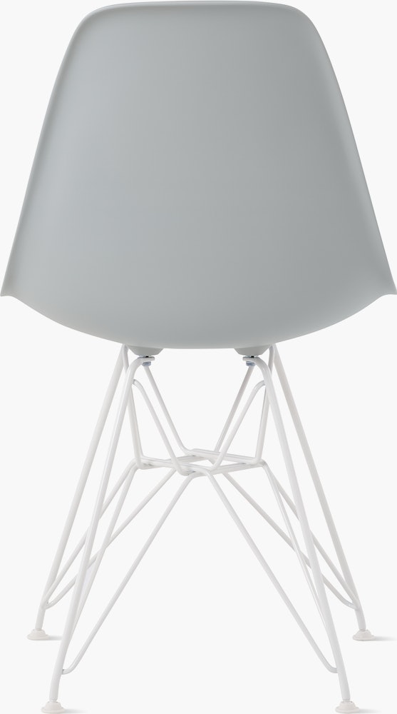 Back of light grey plastic shell chair on wire base.