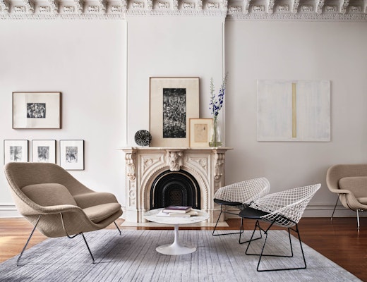 Living Room with Womb Settees & Bertoia Two-Tone Diamond Chairs residential KnollStudio home residence residential living room living area gold diamond