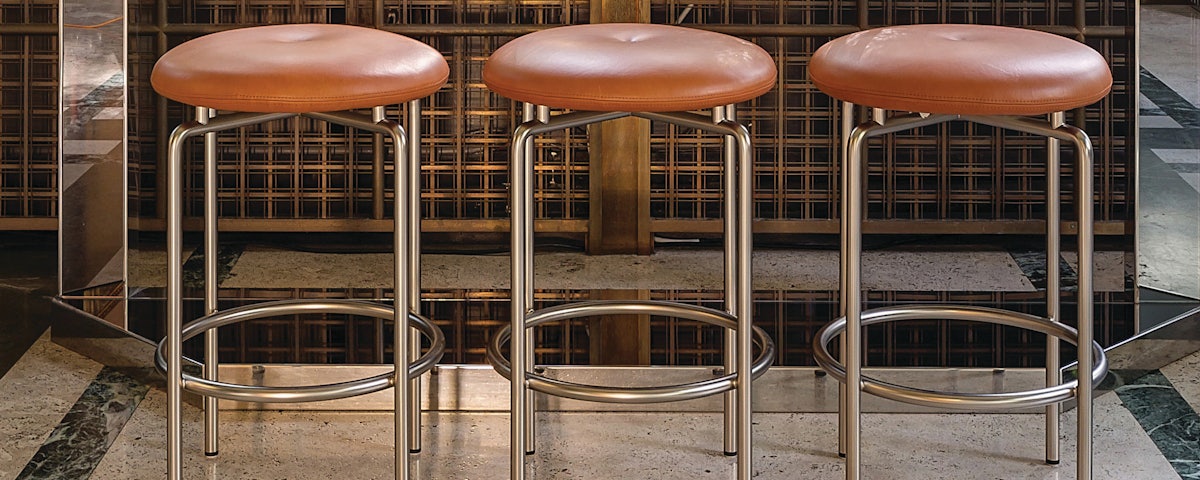 Three BassamFellows Circular Stools at bar setting