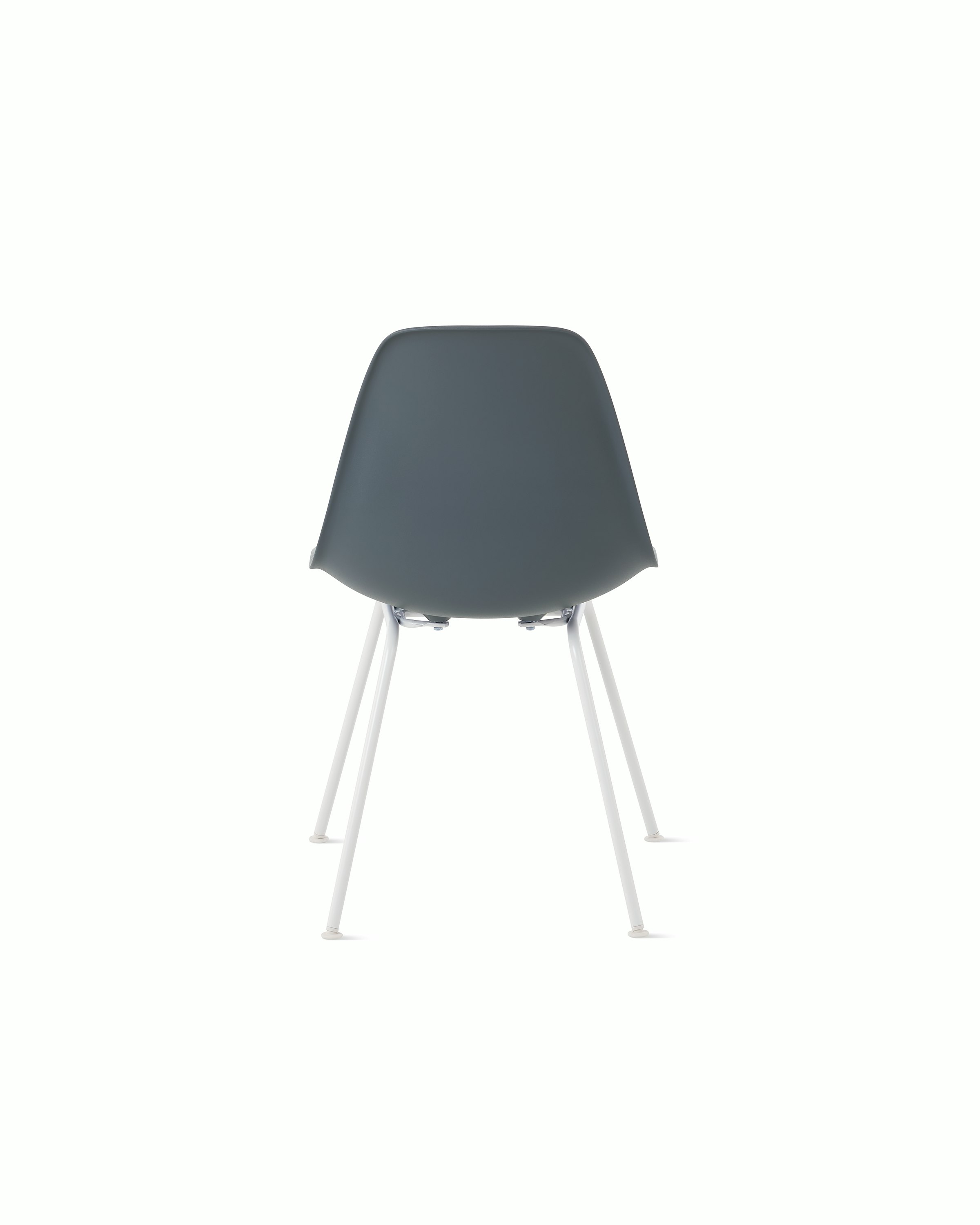 Back of medium grey plastic shell chair on 4-leg base.
