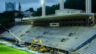 A construction scene showing the renovation process of the stands of the Pacaembu Sports Complex by RADDAR