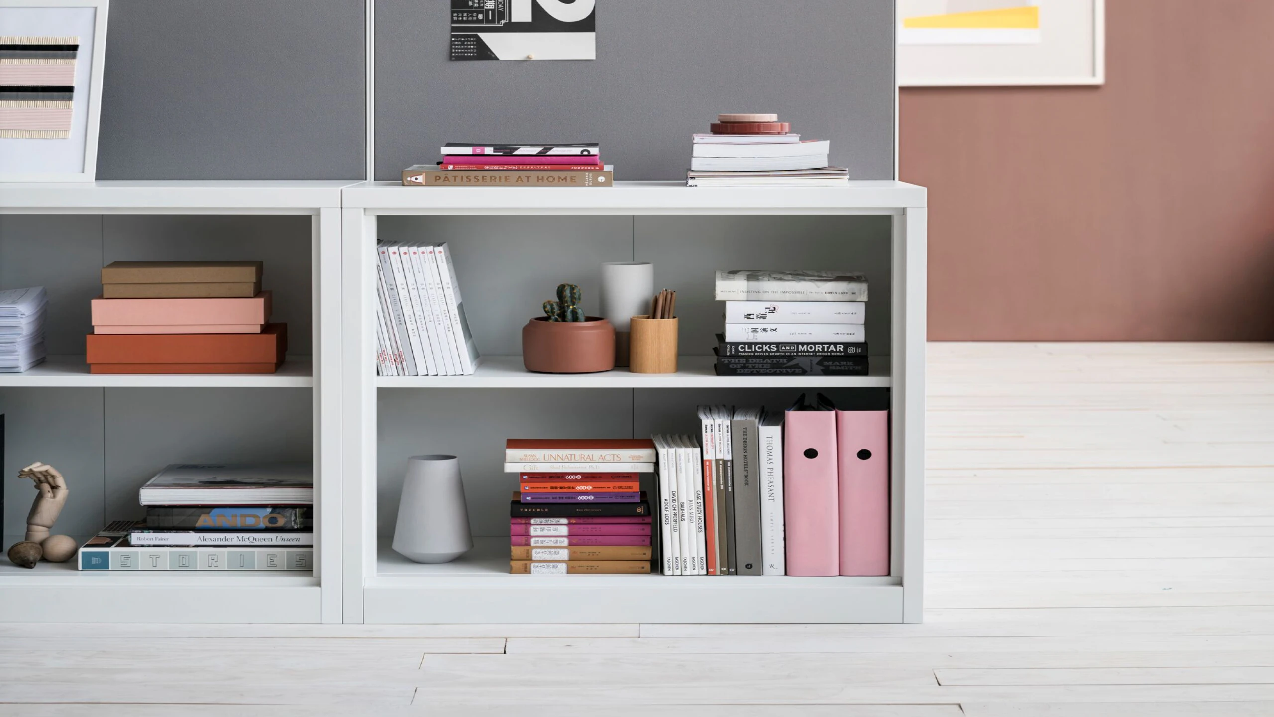 A close-up of a high-cabinet pin board attached to two mid-height CK2 Storage cabinet